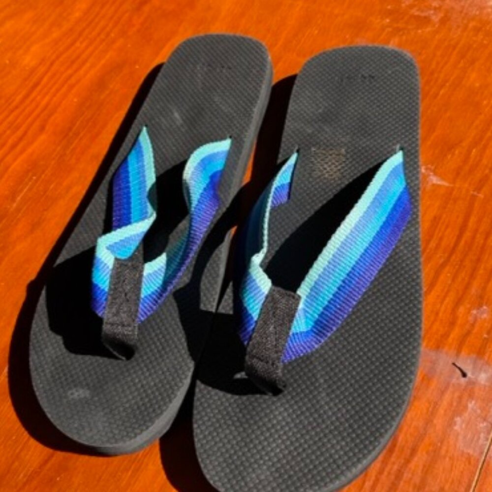 Novelty Flip Flops (has a p***s relief in sole to make shape on sand)